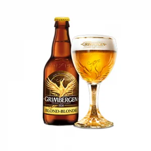 Special beer Grimbergen Blonde with poured Grimbergen beer glass