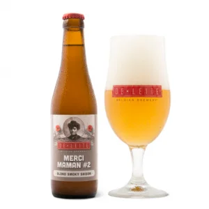 Speciaalbier Merci Maman #2 met ingeschonken bierglas De Leite